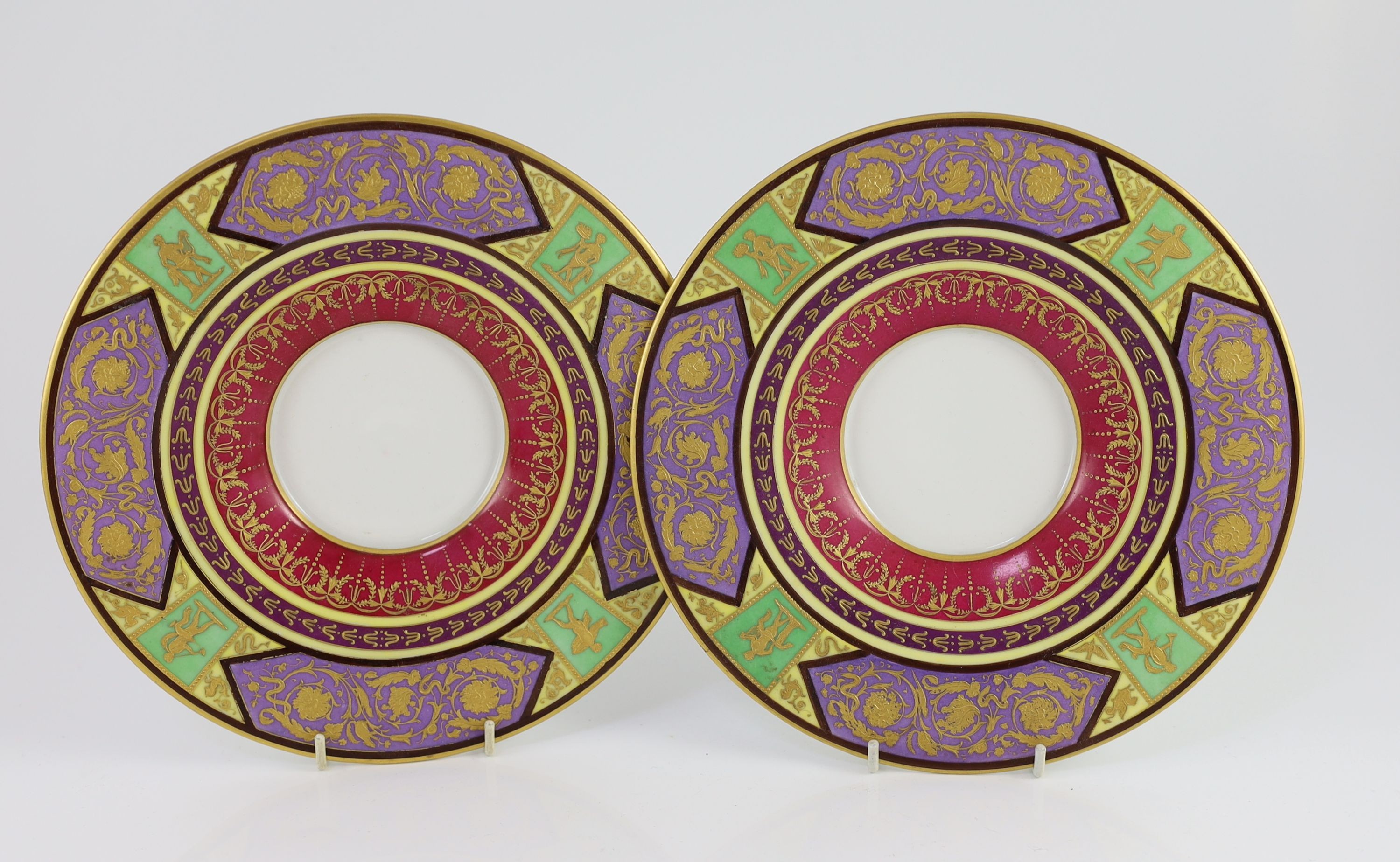 A pair of Vienna style porcelain ecuelles, covers and stands, c.1900, diameter 23.5cm